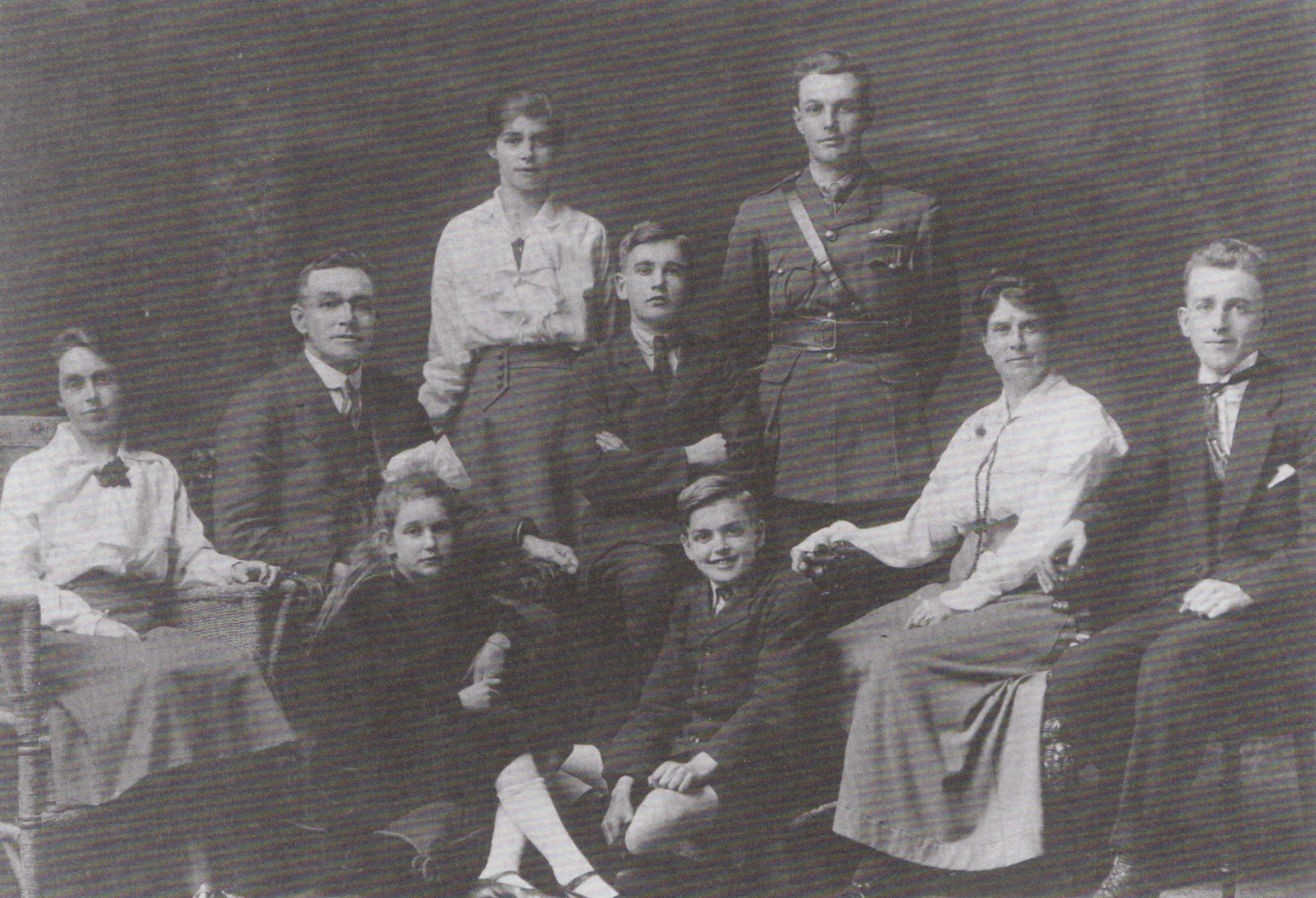 The Todd family in October,1917 before C.P. sails away to war.  He is standing in the back wearing his uniform. Sourced from: Enterprise and Energy: The Todd Family of New Zealand, written by Ross Galbreath