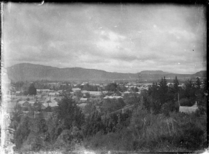 View of town, probably Rotorua. Photograph taken ca 1895-1916, probably by Robina Nicol of Wellington.