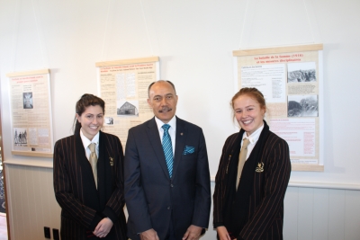 Shared Histories exhibition Opening in Wellington. Baradene College students Olivia Mendonca and Genevieve Bowler with the Governor-General of New Zealand, Sir Jerry Mateparae.