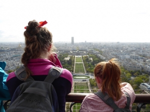 Photo of Paris taken from la tour Eiffel, including myself and my sister. 
